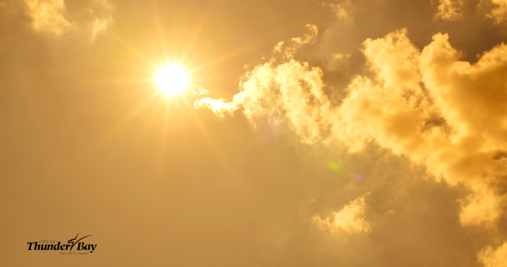 A graphic features a photo of a scorching hot sky