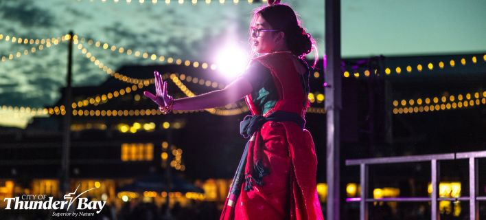woman dancing on stage at Under the Lights
