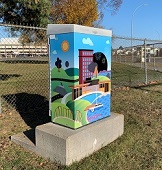 Photo of "Mini City" artwork by Jordan Danielsson on traffic signal box