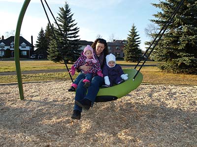 Girls on large swing at Hillcrest Park