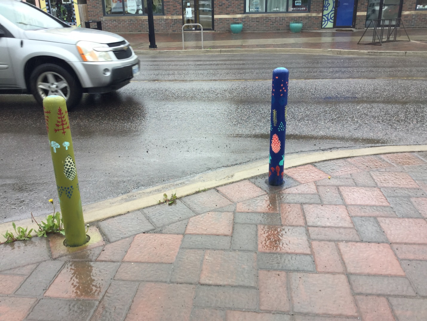 Algoma Street planter painted green and blue