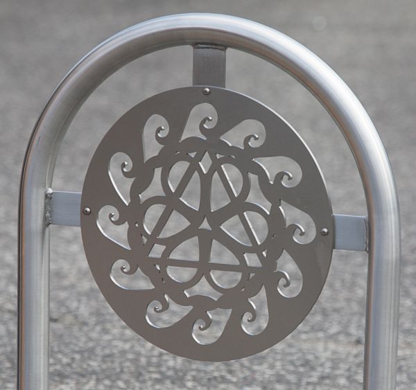 geometric design carved into bike rack