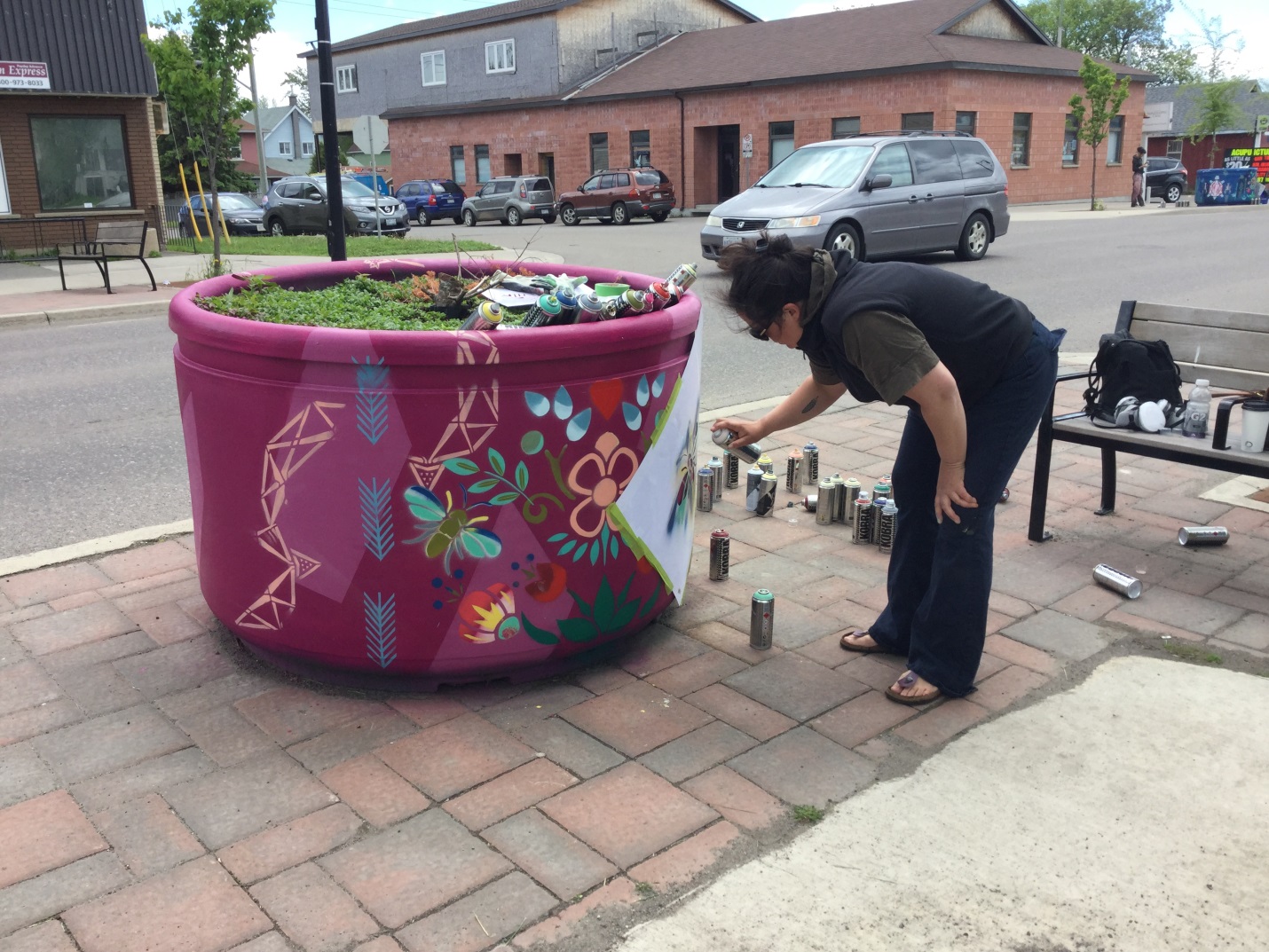 Algoma Street planter with flowers painted on it