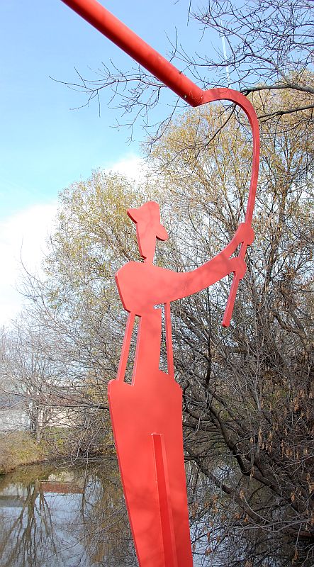 The Angler and the fish sculpture, closeup of angler