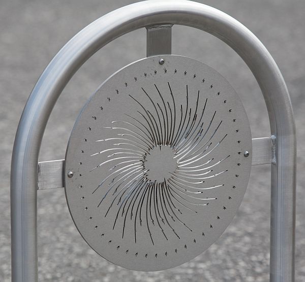 wheel design carved into bike rack