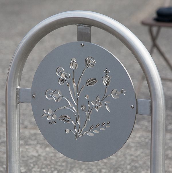 plant design carved into bike rack