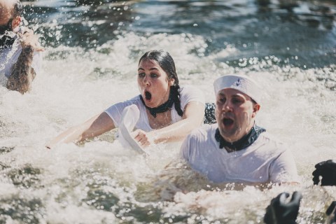 Plunge participants jumping in the water