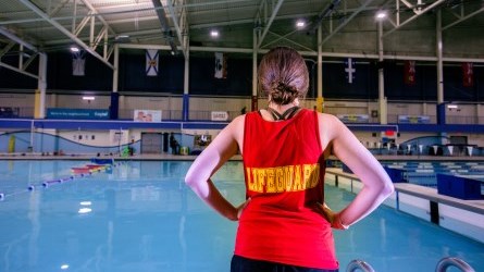lifeguard beside pool