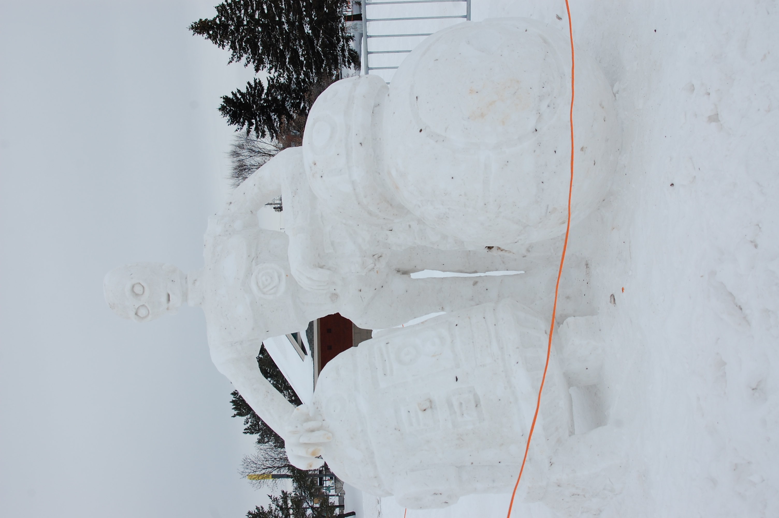 Two snow sculptures of the star wards characters R2D2 and BB-8