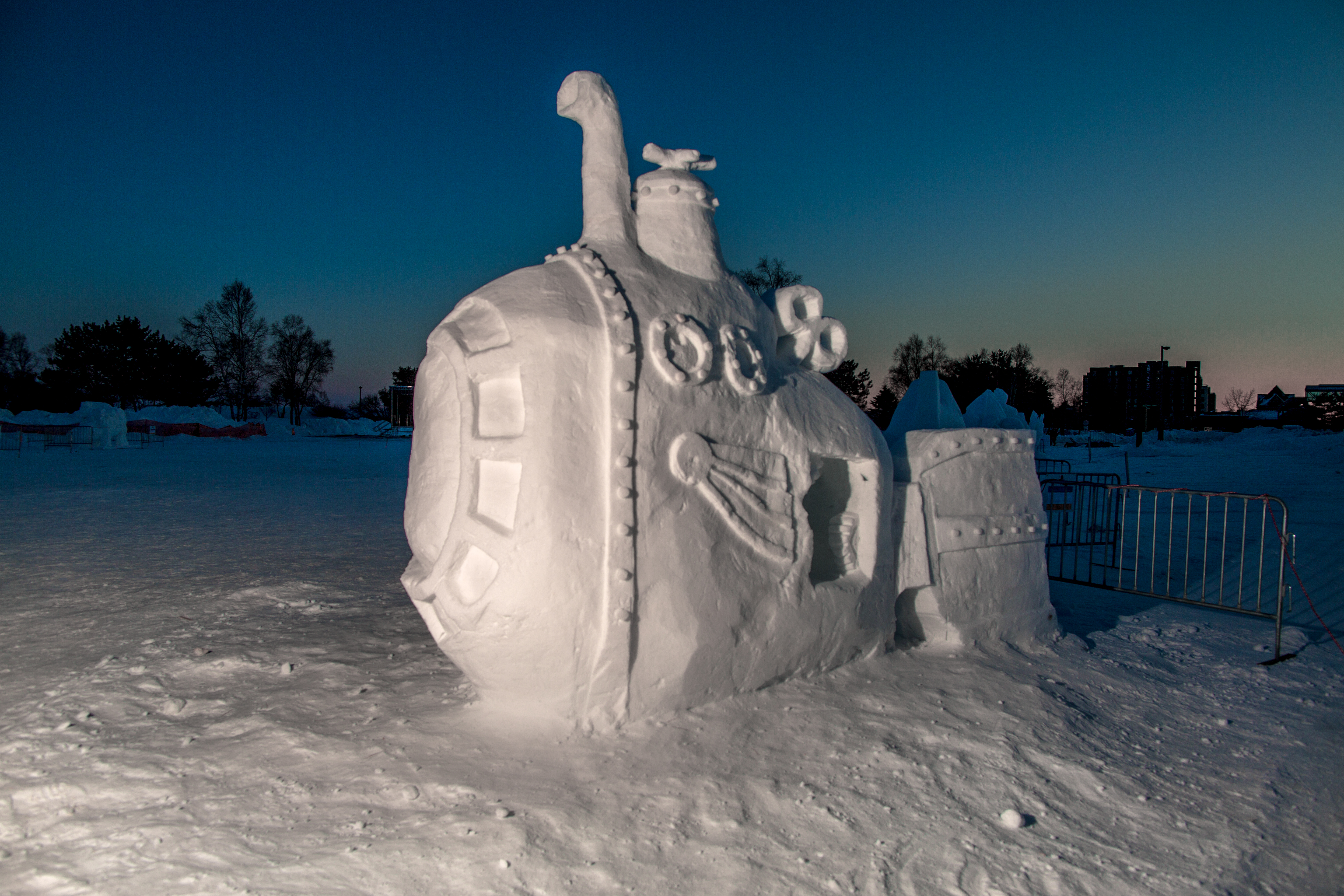 A snow sculpture of a steampunk style submarine