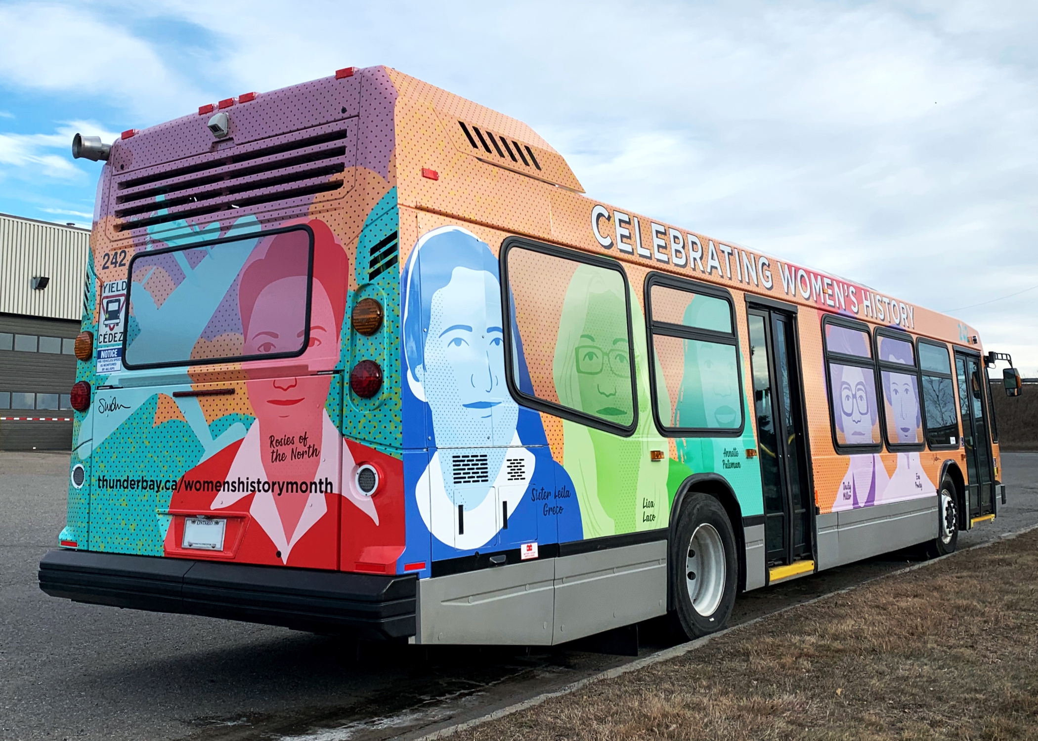Womens History art bus, showing the back and right side of the bus with portraits of women in vibrant colours