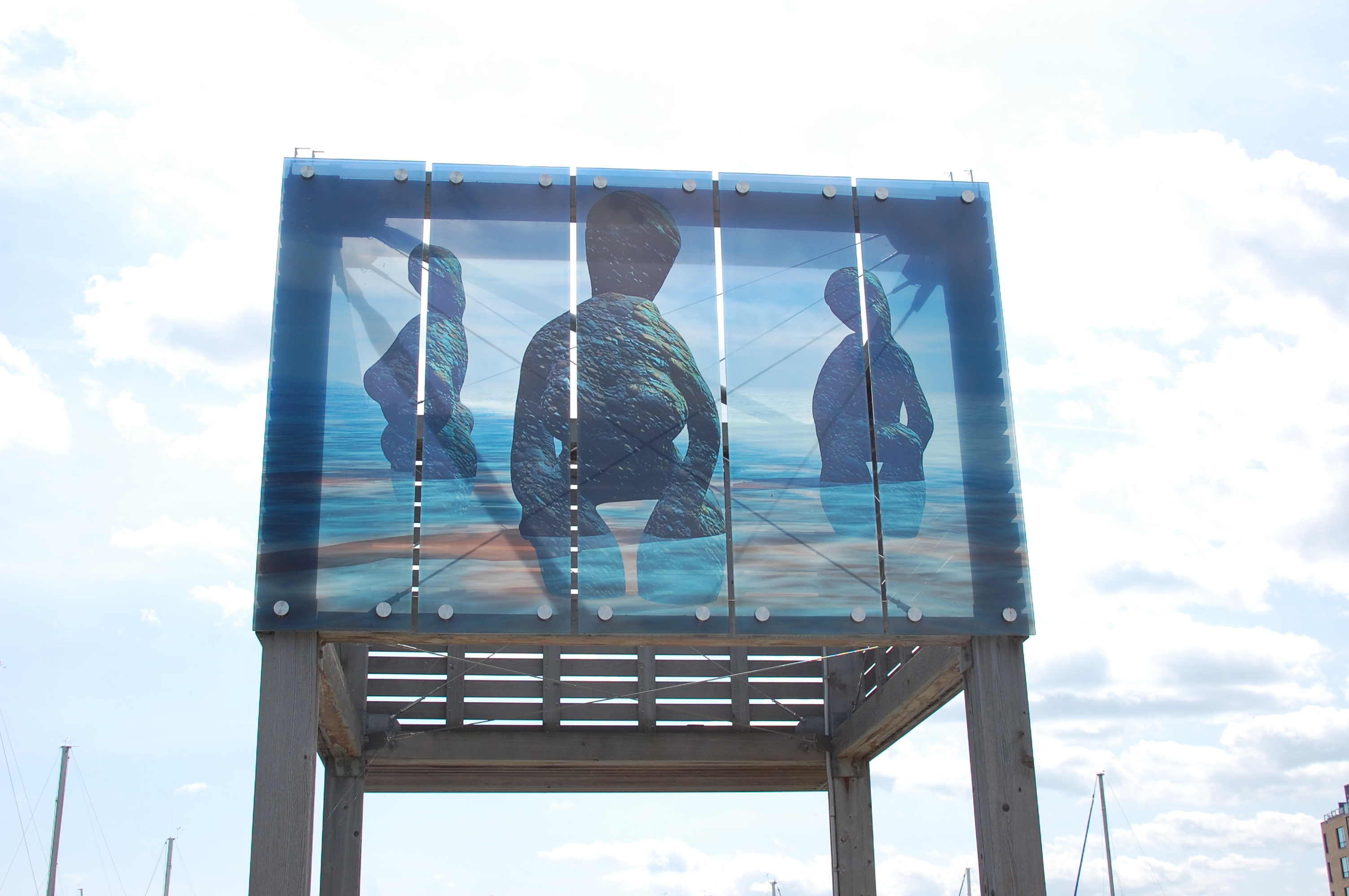 A glass pane install of the artwork Paleogirls