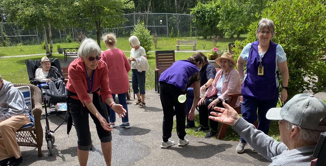 Volunteer with residents and staff
