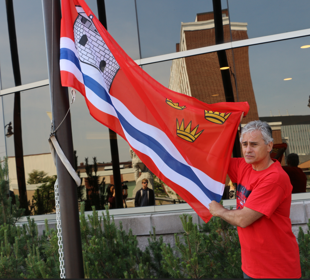 Mayor Bill Mauro Raising City of Kingston Flag
