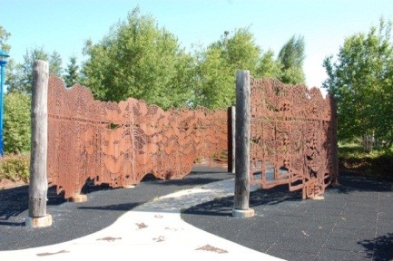 A sculpture of a stainless steel cut-out mural wall