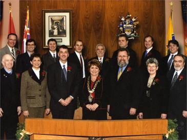 The 2007 City Council standing and sitting for an official portrait with the mayor at the centre