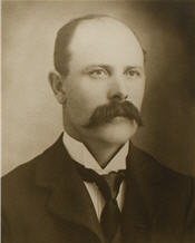 Mayor W. F. hogarth wearing a black suit