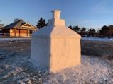 A snow sculpture replica of the Thunder Bay Main Lighthouse
