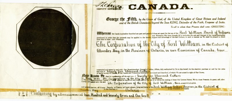 A white paper with black seal, detailing the deed to Chippewa Land