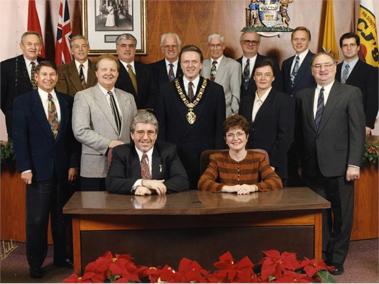 The 1996 City Council standing and sitting for an official portrait with the mayor at the centre