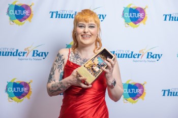 Ivan Love with their award