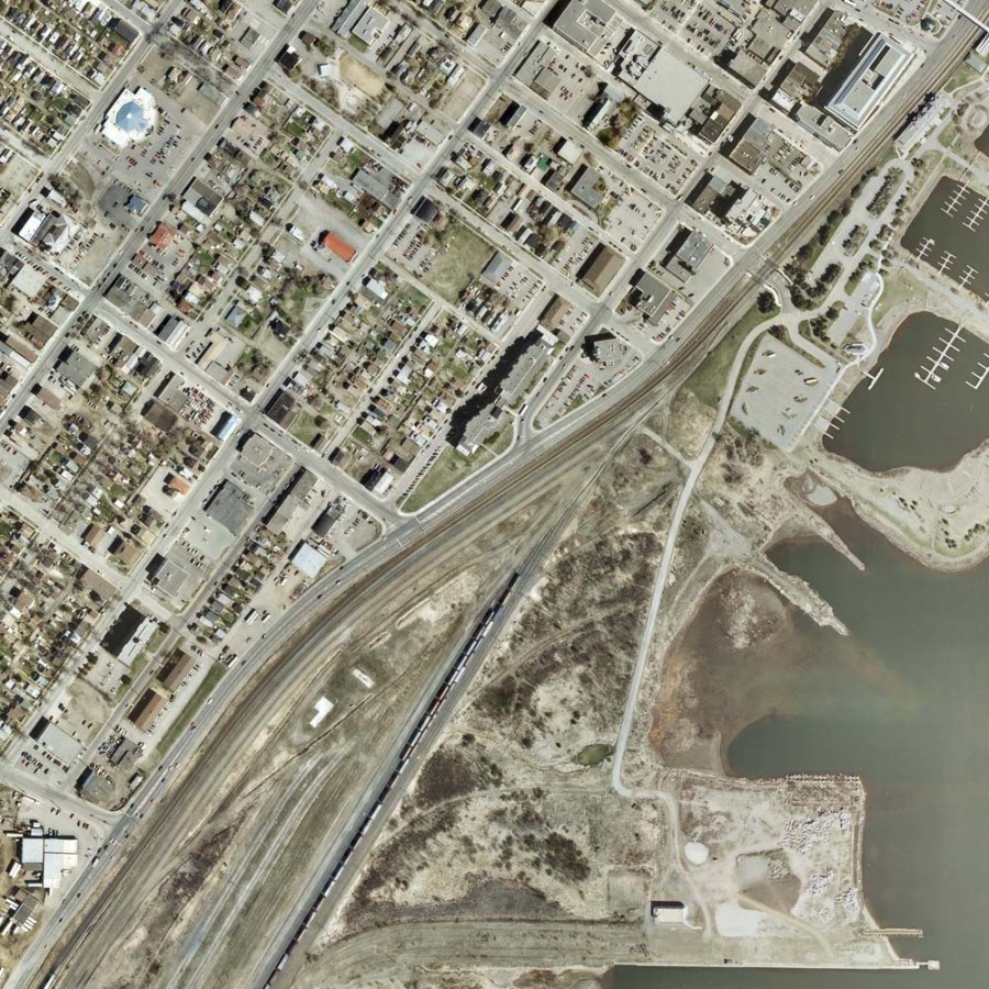 A coloured aerial photo of the waterfront and surrounding area