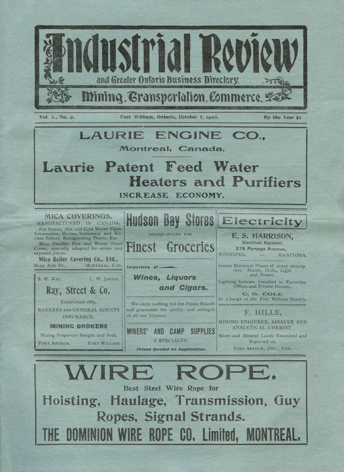 A blue paper with black writing that says industrial review at the top