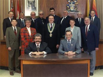 The 1993 City Council standing and sitting for an official portrait with the mayor at the centre