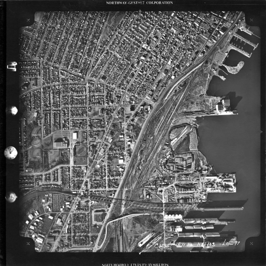 A black and white aerial photograph of the Thunder Bay waterfront