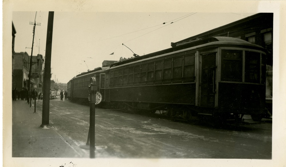 a streetcar travelling down a street