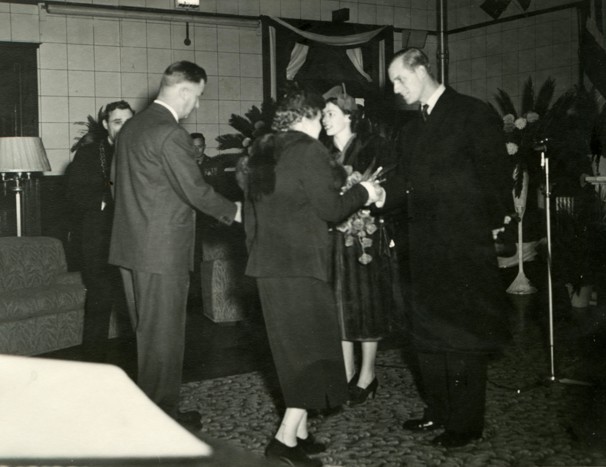 Dorothy Mary Pickup shaking hands with Princess and Prince