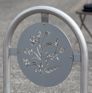 geometric design carved into bike rack