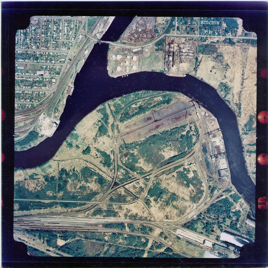 A coloured aerial photograph of the waterfront and surrounding area