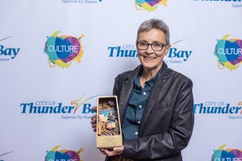Sue Paskoski with her award